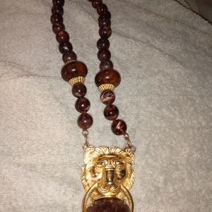 Vintage necklace with lion pendent